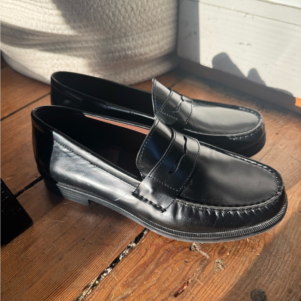 Black loafers never worn